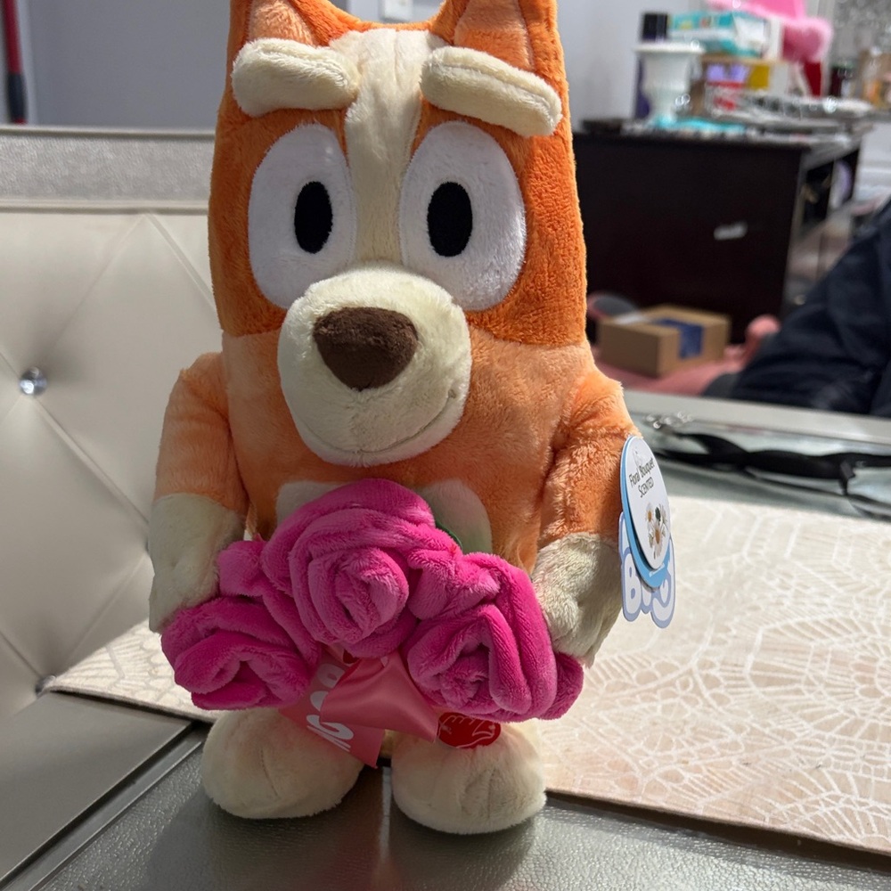 Orange and Pink Plush Dancing Bingo Toy. Animated plush.